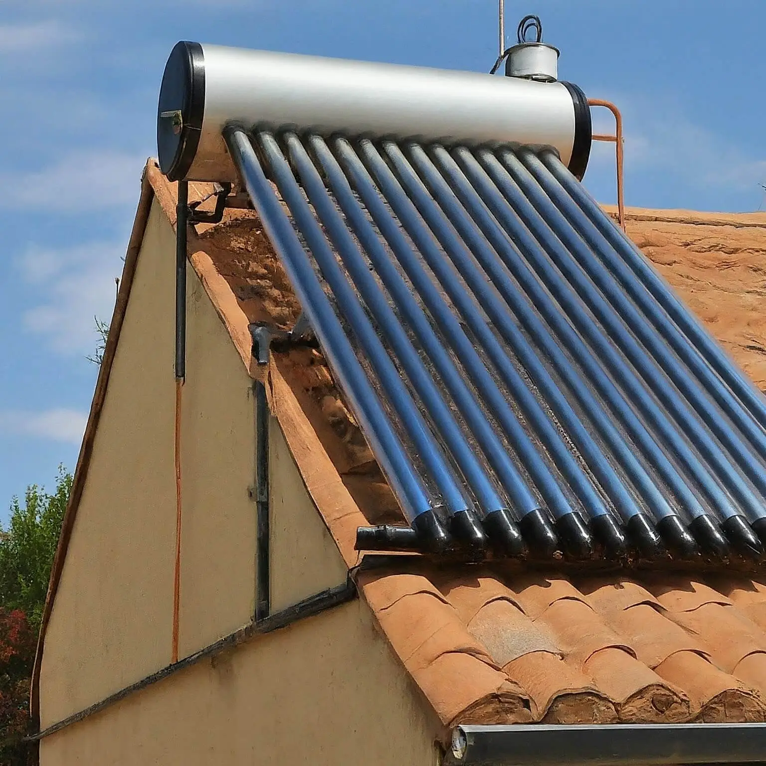 Solar Water Heater Cost Calculator: Compare Prices & Save Money 1 house with solar water heater installed 1